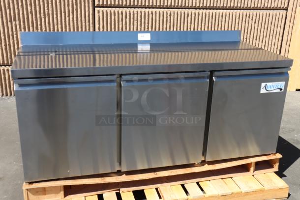 Avantco SS-WT-72R-HC 72in three-door worktop refrigerator, stainless steel, damaged front right wheel, new condition.