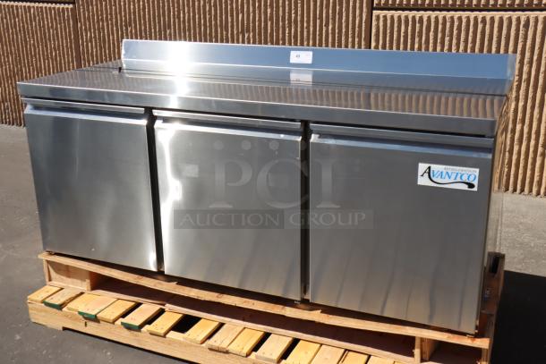 Brand new Avantco SS-WT-72R-HC 72" three-door worktop refrigerator, 115V, minor wheel damage, serial# 522547828 6082 2405.
