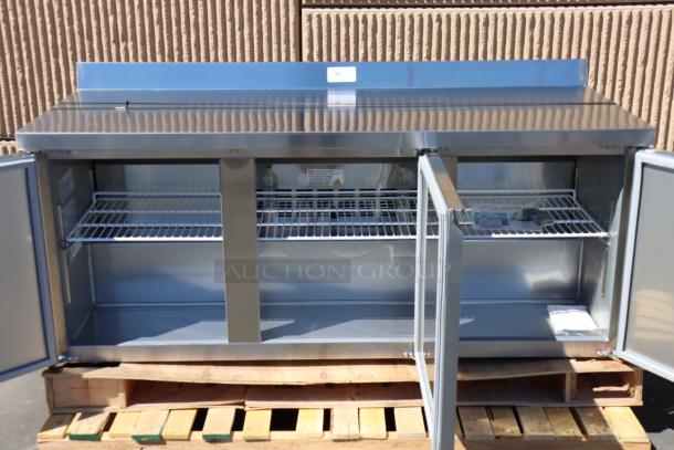 Brand new Avantco SS-WT-72R-HC 72in three-door worktop refrigerator. Front right wheel damaged. Includes backsplash.