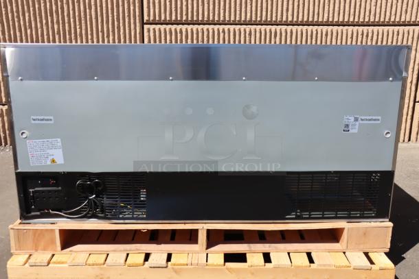 Brand new Avantco SS-WT-72R-HC 72in three-door worktop refrigerator, 115V, with damaged front right wheel.