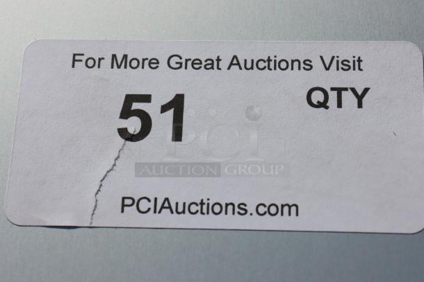 Sticker with text "For More Great Auctions Visit PCI Auctions.com," number "51," and "QTY" on a metallic surface.