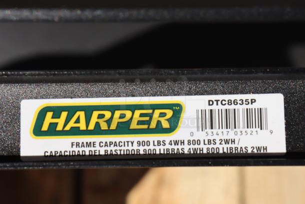 Harper DTC8635P 900 lb. 4-in-1 hand truck, dual handles, 10" rubber wheels, new scratch-n-dent, label shows frame capacity.