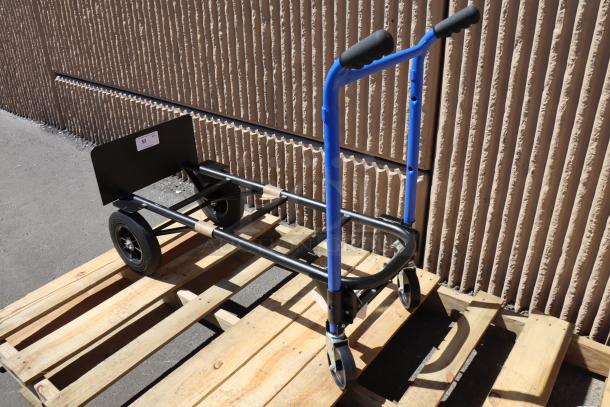 BRAND NEW Harper DTC8635P 4-in-1 hand truck, 900 lb capacity, dual handles, 10" solid rubber wheels, on wooden pallet.