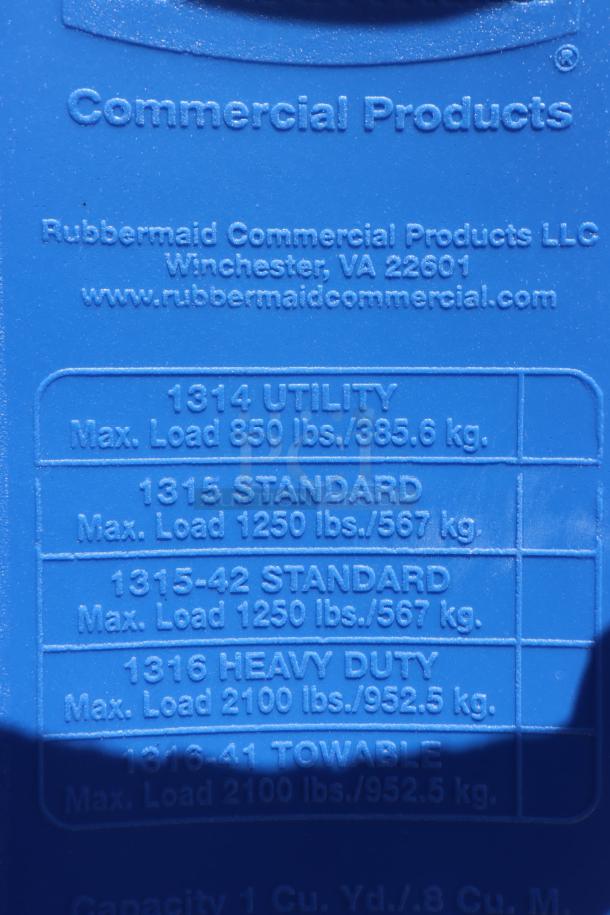 Rubbermaid® 2089826 BRUTE Blue 1 Cubic Yard Tilt Truck label, shows Winchester, VA address, load capacities. Missing one caster.