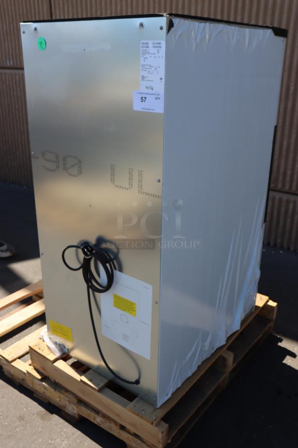 Avantco Ice HBN120-22 22" Hotel Ice Dispenser, 120 lb. Capacity, shown on a pallet, minor dings, out of packaging. Serial: AV2410100025.