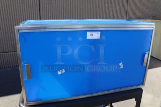 BRAND NEW Cal-Mil 22323-55 3-Tier Bakery Display Case, 42"x17"x23", stainless steel frame, blue protective film, missing base panel.