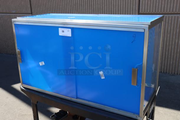 Cal-Mil 22323-55 3-Tier Bakery Display, 42"x17"x23", scratch-n-dent, stainless steel, with protective film, missing base panel.