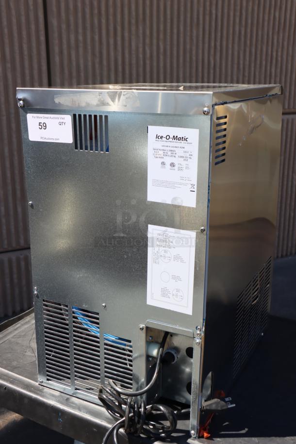 Brand new Ice-O-Matic UCG060A ice machine, air-cooled, 63 lb. capacity, minor scratches, missing small parts, 115V.