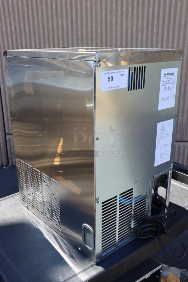 Ice-O-Matic UCG060A 15" undercounter ice machine, scratch-n-dent condition, stainless finish, serial LL 008421, missing screws.