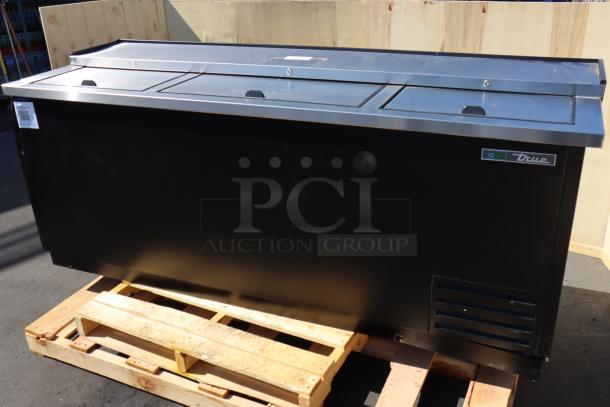True TD-80-30-HC black horizontal bottle cooler, new with scratches and dents. Serial No. 11048459. 80 1/8", 115V, 2.8A, 1 phase.