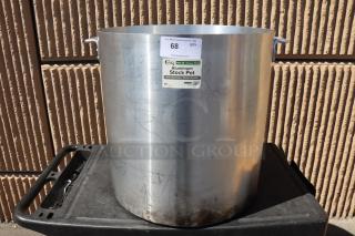 Choice 471SP160QTHD 160 Qt. aluminum stock pot, heavy weight, with handles. Visible wear, labeled NSF certified.