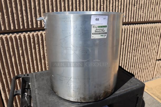 Choice 471SP160QTHD 160 Qt. aluminum stock pot, heavy weight, riveted handles, visible scratches, auction tag shown.