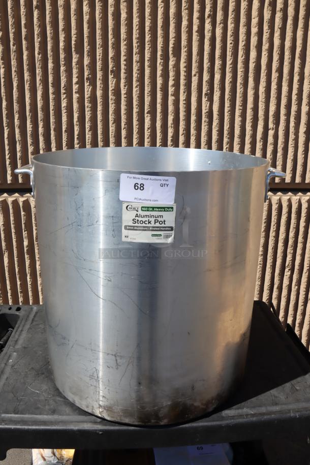 Choice 471SP160QTHD 160 Qt. heavy weight aluminum stock pot with labels, in good used condition, showcasing riveted handles.