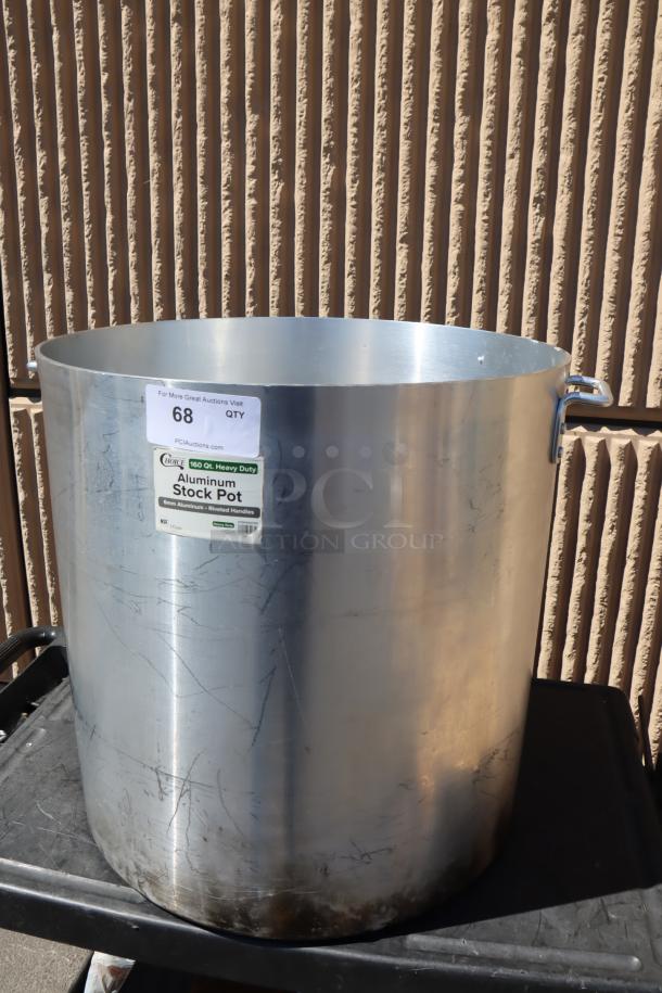 Choice 471SP160QTHD 160 Qt. heavy weight aluminum stock pot with riveted handles. Some surface scratches visible.