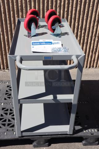 Lavex 257LSUC18303 steel utility cart, 30"x18"x35", three-tray, fully welded, with red casters and assembly instructions.