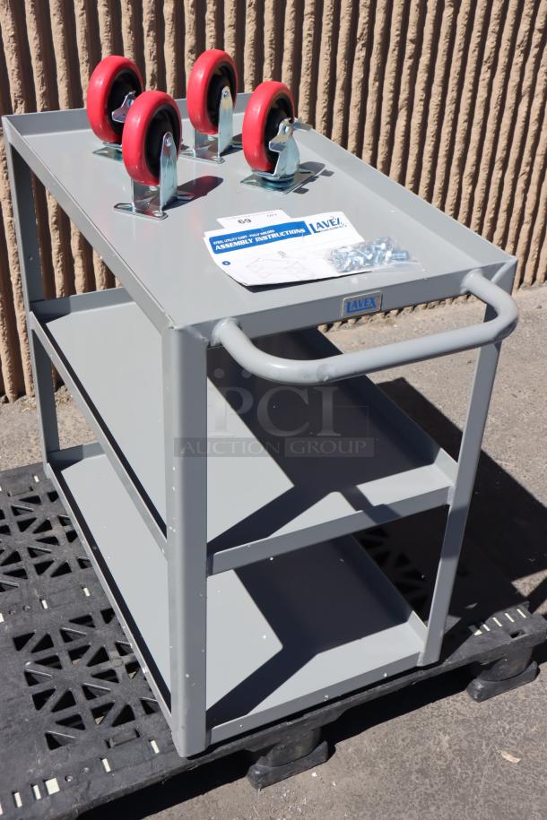 BRAND NEW Lavex 257LSUC18303 utility cart, 30"x18"x35", three tray shelves, steel, minor scratches, missing parts.