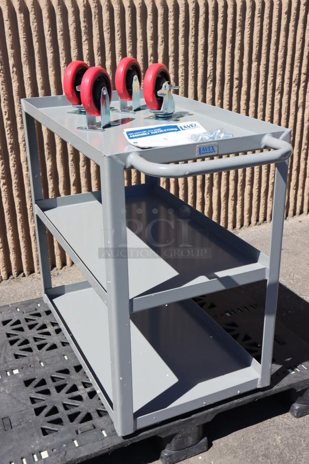 "Lavex 257LSUC18303 30x18x35 steel utility cart, three trays, fully welded, new, with minor scratches. Includes wheels, assembly instructions."