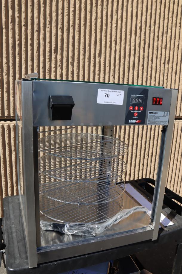 ServIt PDW18D1S Countertop Display Warmer, 18", 4 shelves, dented, missing back & right glass panels, door on top. SERIAL #: 1685004080132