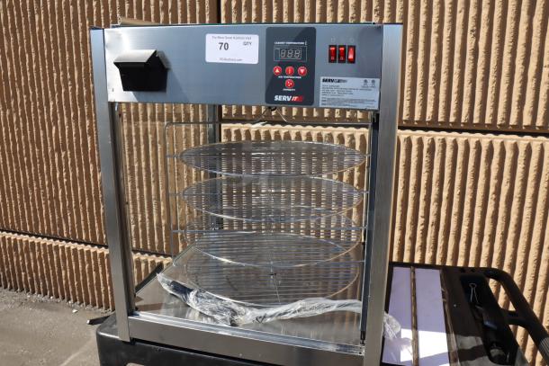 ServIt PDW18D1S 18" display warmer, 4 shelves, dented, missing back & right glass panels, door on top. Serial: 1685004080132.