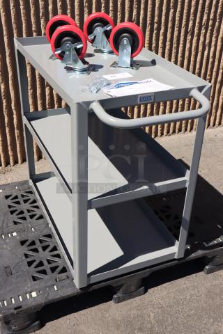 Lavex 257LSUC18303 steel utility cart, 30"x18"x35", three trays, fully welded, minor scratches, includes wheels and hardware.