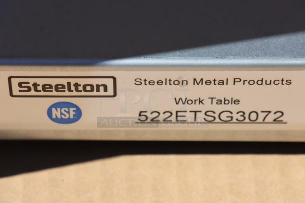 Steelton 522ETSG3072 work table label, showing model and NSF certification. Brand new, 18 gauge 430 stainless steel.