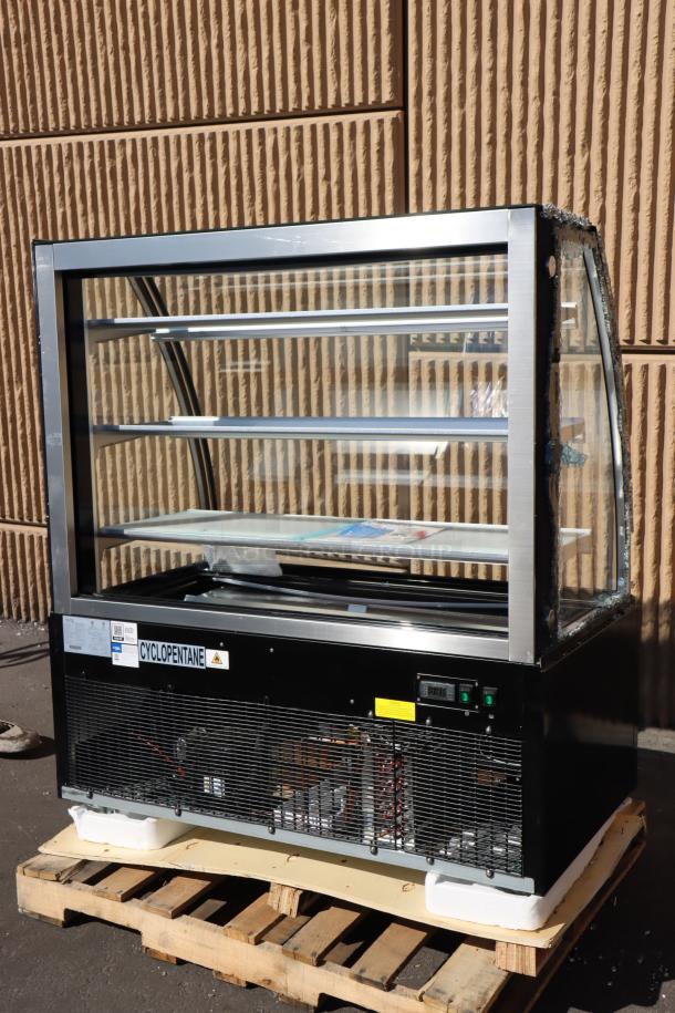Avantco BCT-48 49" black refrigerated bakery display case, 3-shelf, LED lighting; left glass pane broken. Serial: 1638412280053.