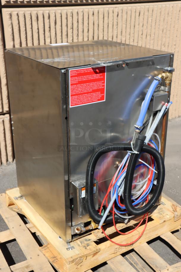 Brand new Noble Warewashing UL-30 dishwasher, low temp, built-in chemical pumps, on pallet, minor scratches visible.