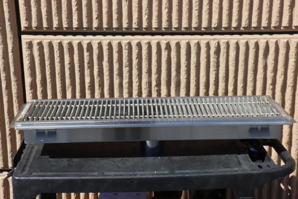 BRAND NEW Regency 600FT1242SS 12" x 42" stainless steel floor trough with grate. 14-gauge. 2 bent fins on grate.