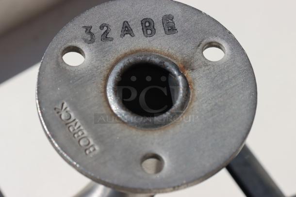 Bobrick B-5181 shower seat component showing stamped "32ABE" and "Bobrick" branding. Missing wall mount.