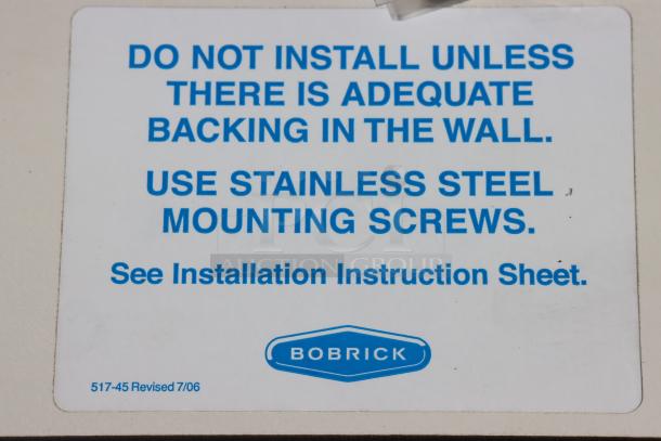 Bobrick B-5181 white reversible phenolic folding shower seat. New, scratch-n-dent. Missing wall mount. Usage instructions label.