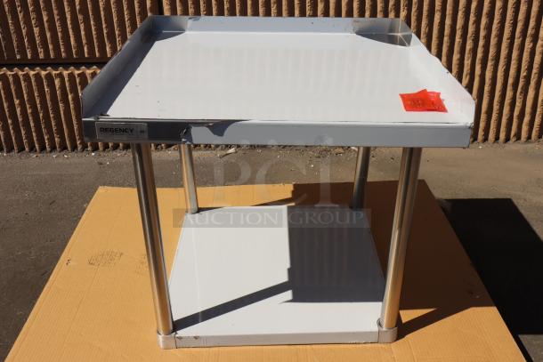 Regency 600ES3030S equipment stand, 30"x30", 16-gauge stainless steel, with undershelf, visible scratch on surface.