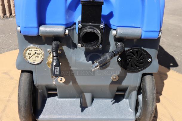 Lavex 3-500 carpet extractor base with PSI gauge, dual connectors, and sturdy wheels, indicating new condition.