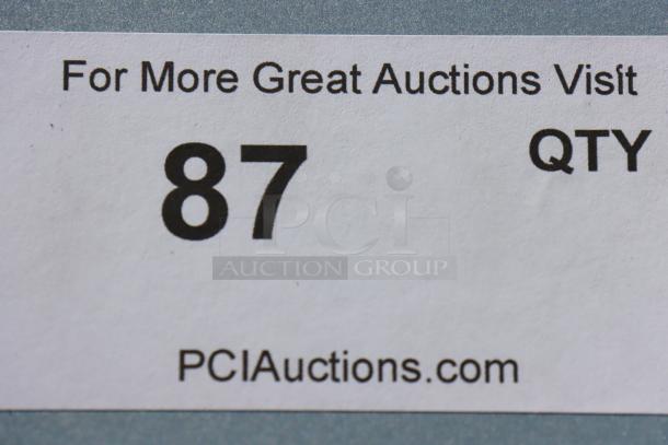 Label reading "For More Great Auctions Visit PCIauctions.com" with number 87.