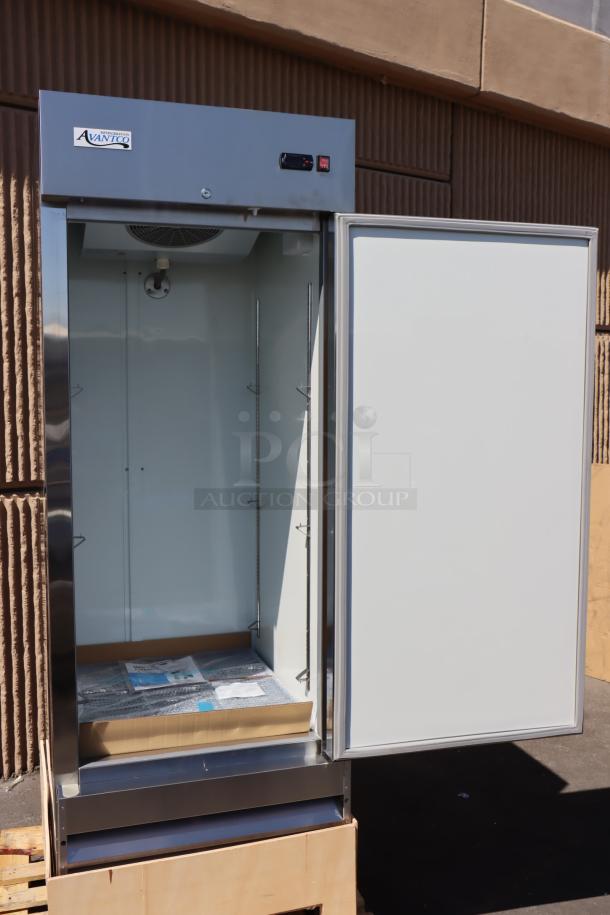 Brand new Avantco A-23R-HC 29" solid door reach-in refrigerator, 115V, 348W, open door, minor scratches visible.