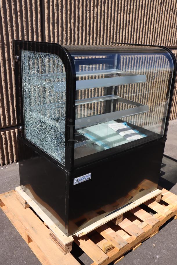 Avantco BC-36-HC bakery display case, black, 36", curved glass, broken left-side glass, on pallet, serial 1631212120003.