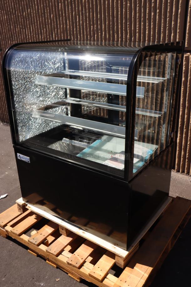 Avantco BC-36-HC 36" curved glass black refrigerated bakery display case, broken glass on left side, model BC-36-HC.