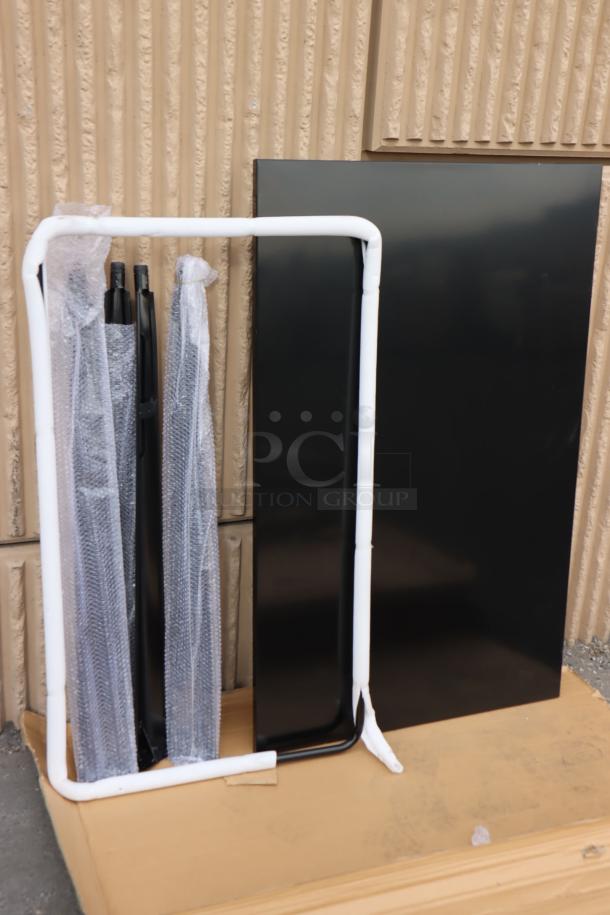 Brand new scratch-n-dent Lancaster Table & Seating 48"x30" onyx black outdoor bar table, unassembled, model 164RB304BLK.