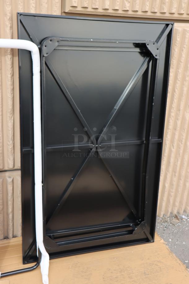 Brand new Lancaster Table & Seating Alloy 48" x 30" rectangular onyx black bar height outdoor table, unassembled, scratch-n-dent.