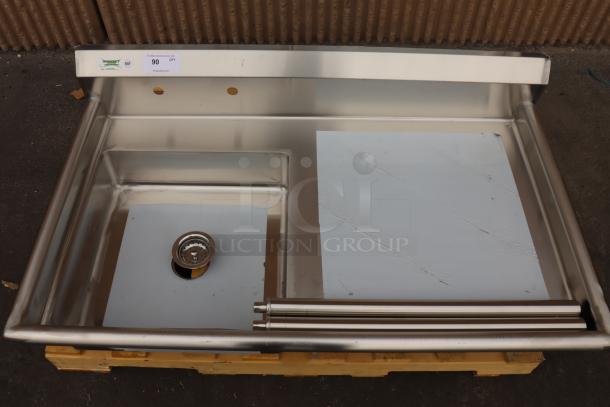 Regency 600UDT50L 50" stainless steel soiled undercounter dishtable with left sink, scratch-n-dent, out of packaging.