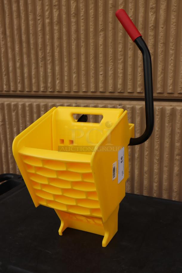 Brand new Rubbermaid® 2064959 WaveBrake® yellow mop wringer, durable plastic, down press design, with handle, labeled.