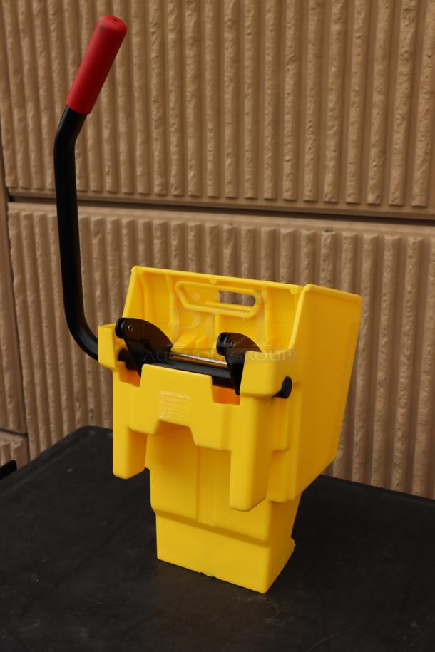 BRAND NEW Rubbermaid® 2064959 WaveBrake® yellow mop wringer with down press. Durable, ergonomic handle.