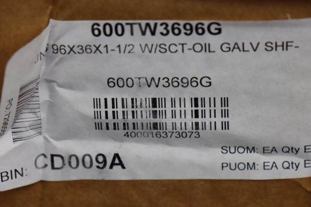 Regency 600TW3696G wood top work table tag, includes barcode, indicates packaging damage and possible missing hardware.