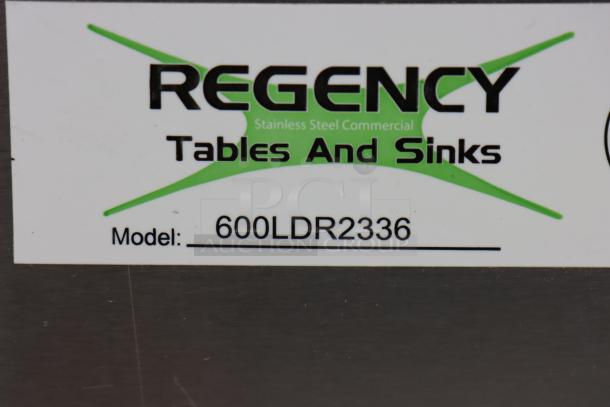 Regency stainless steel liquor display rack, model 600LDR2336, five-tiered, 36" wide, 23" deep, brand new scratch-n-dent.