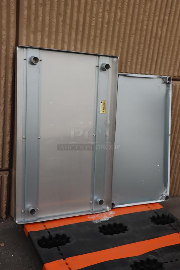 BRAND NEW Regency 600ES3048G 30"x48" stainless steel equipment stand. Includes galvanized undershelf. Minor scratches visible.