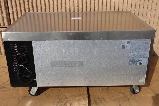 Brand new Avantco CBE-48-HC 48" 2-drawer refrigerated chef base, 115V, 4.32 Amps, 343 Watts, on casters, no original packaging.