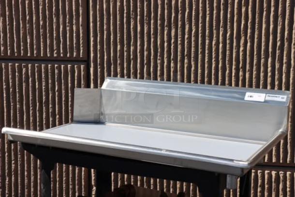 Regency 600CDT48R 4' stainless steel clean dish table with right drainboard; scratch-n-dent condition; minor pieces may be missing.