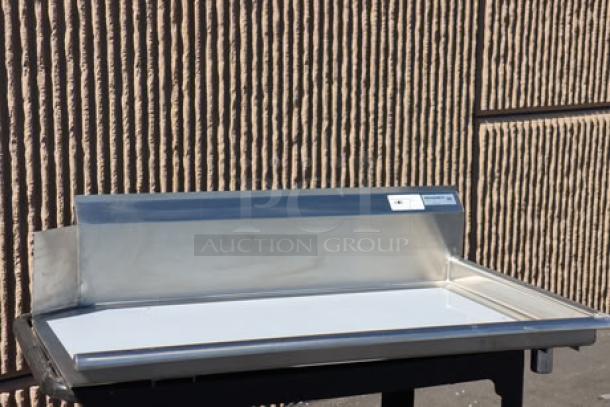 Regency 600CDT48R 4' clean dish table with right drainboard, 16 gauge, stainless steel, scratch-n-dent condition, missing pieces.