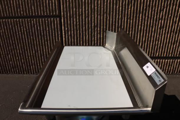 Brand new Regency 600CDT48R 4' clean dish table with right drainboard, 16-gauge steel, scratch-n-dent condition.