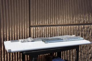 Steelton 24" x 60" work table, 18-gauge 430 stainless steel, open base, new condition with minor scratches, unboxed.