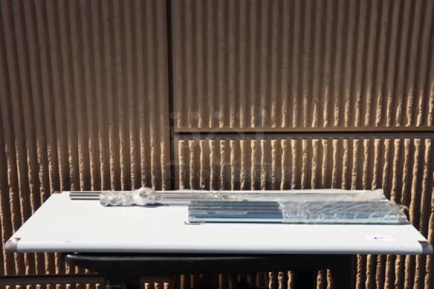 Brand new Steelton 24" x 60" 18-gauge 430 stainless steel work table, open base, scratch-n-dent, unpackaged condition.